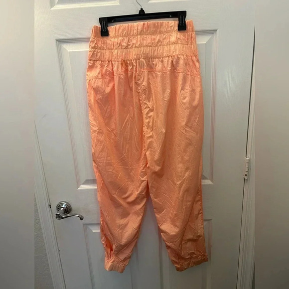 ! FREE PEOPLE MOVEMENT The Way Home Joggers in Papaya Punch Large - Picture 3 of 6